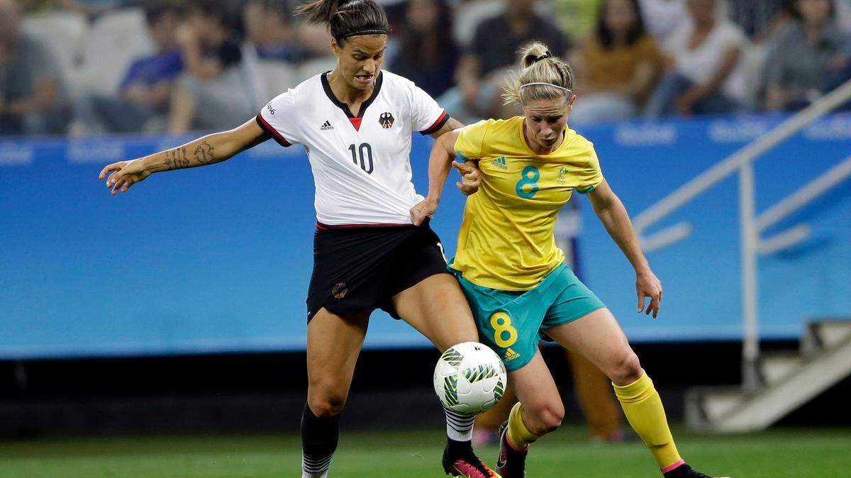 Germany’s Dzsenifer Marozsan, left, and Australia’s Elise Kellond-Knight vie for the ball during a group F match of the women’s Olympic football tournament between Germany and Australia in Sao Paulo, Brazil, Saturday, Aug. 6, 2016. (AP Photo/Nelson Antoine)