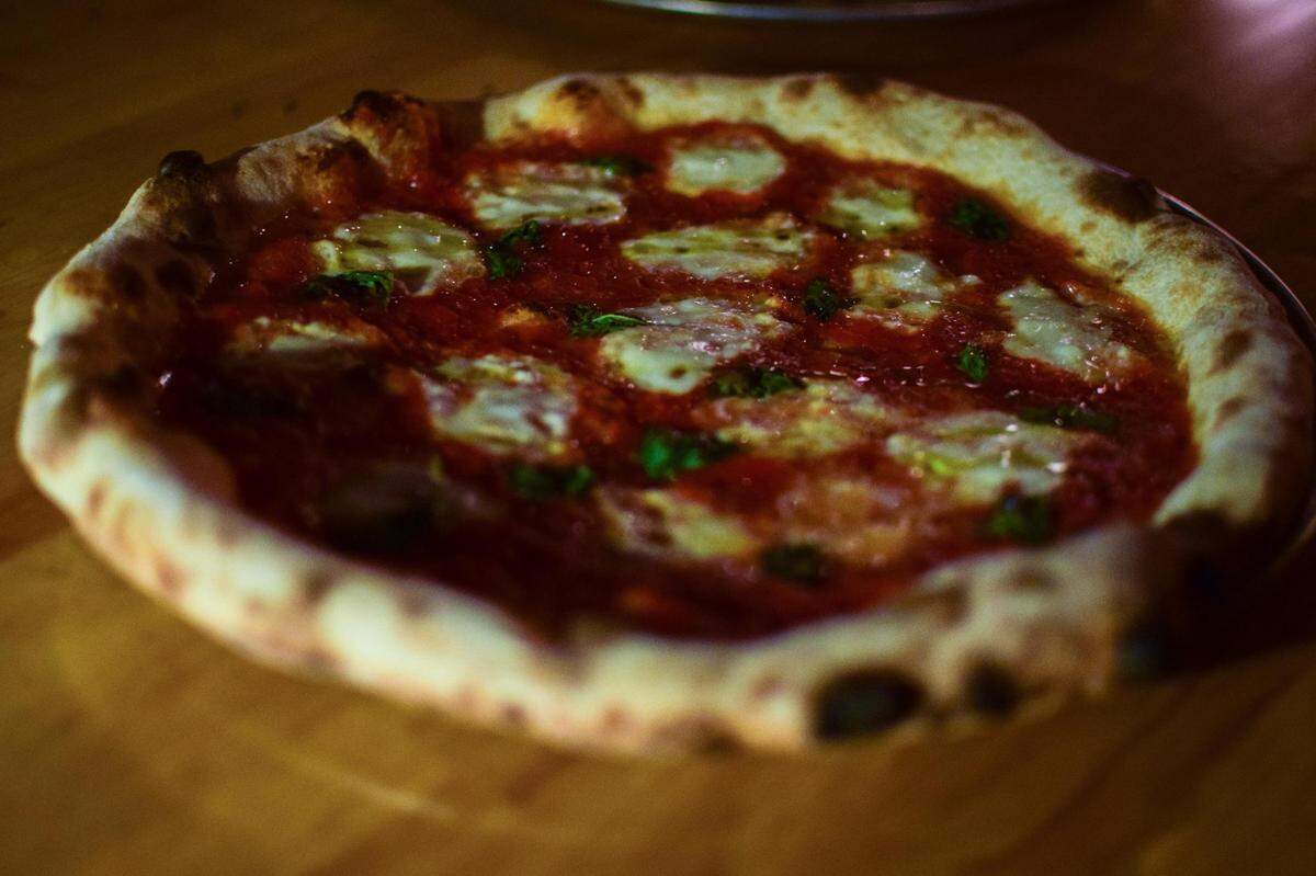 Bar Rosa opened in Tacoma’s Hilltop District in November 2021. With an Italian wood-burning oven as its only cooking surface, the food focuses on Neapolitan pizzas accompanied by amaro-centric cocktails. Pictured here is the margherita on Nov. 19, 2021.