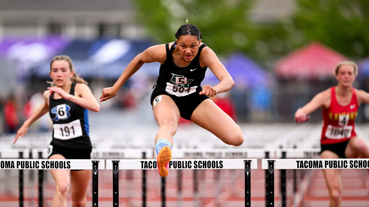 Emerald Ridge’s JaiCieonna Gero-Holt finishes first in the 3A girls 100m hurdles during day 2 of the Track and Field Championship at Mount Tahoma High School, on Friday, May 24, 2024, in Tacoma, Wash.