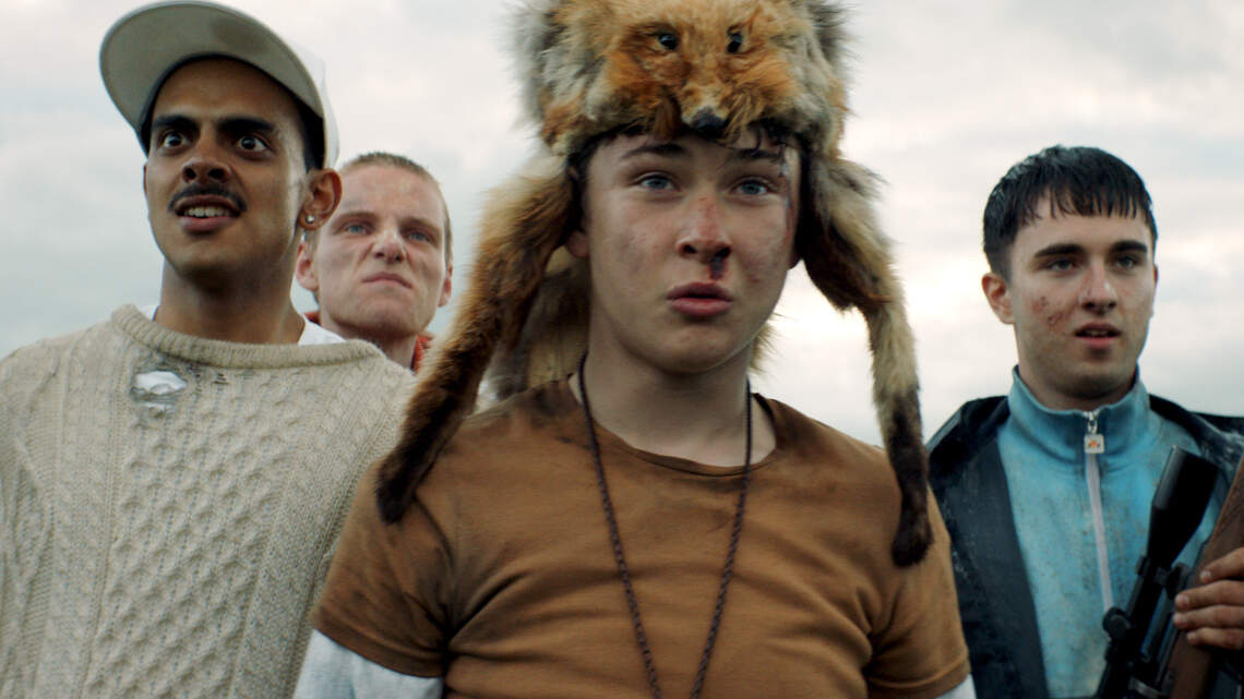 ‘Get Duked!’ sees a group of teens on the run from a murderous Eddie Izzard