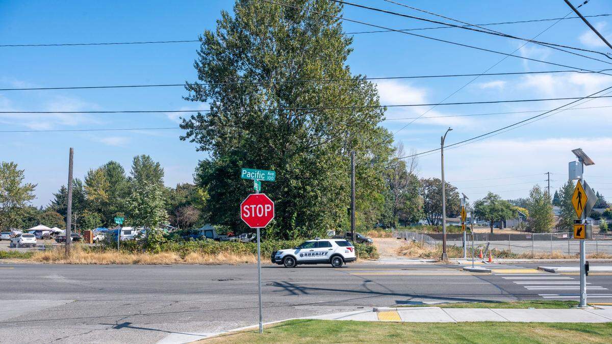 A homeless encampment sits alongside the future site of a homeless mitigation site being built on the 3500 block of Pacific Avenue on Wednesday, Sept. 21, 2022. The mitigation site is planned to open in October which would force the people living in the homeless encampment to move under a new ordinance prohibiting camping near city-run shelters that was proposed on Sept. 20, 2020 by the Tacoma City Council.
