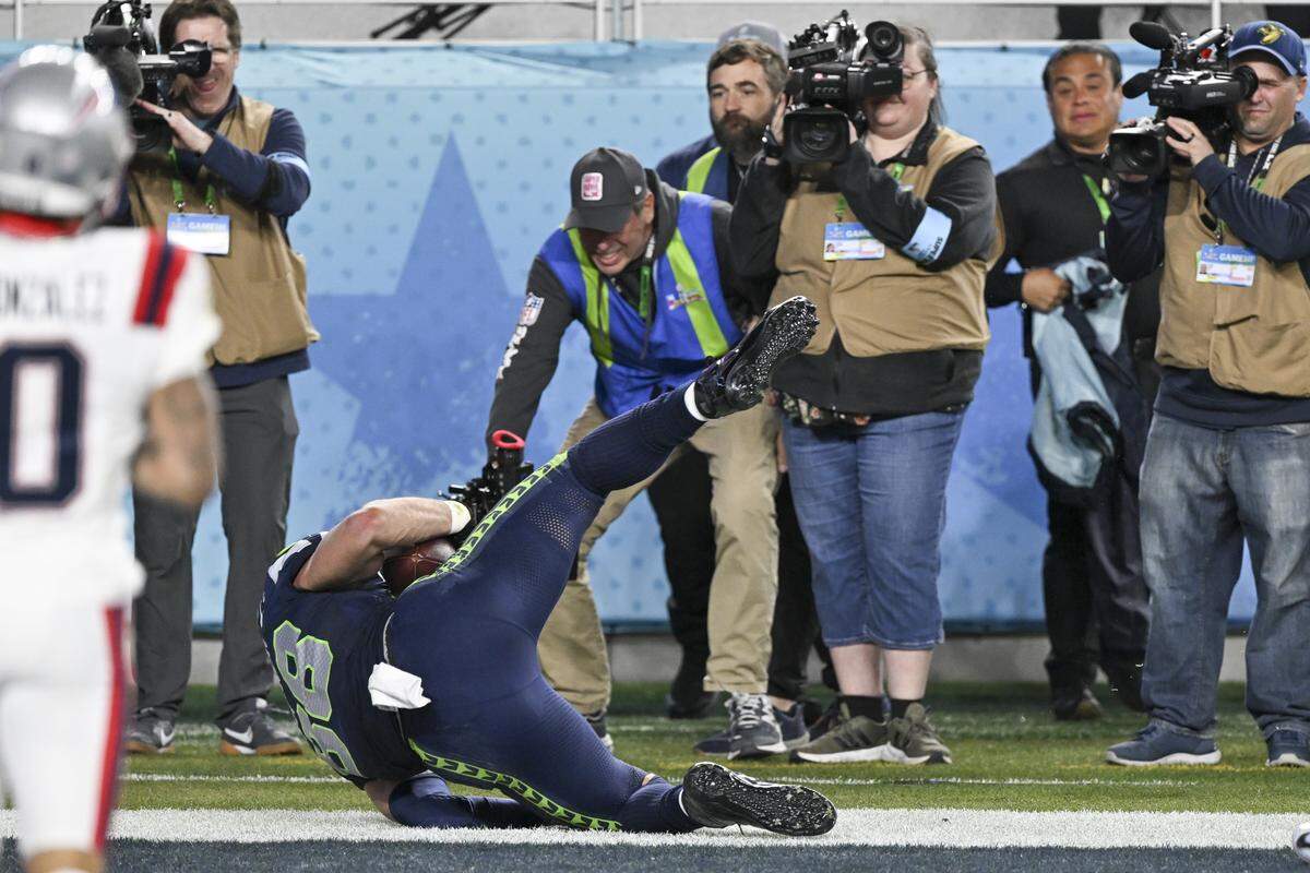 Seattle Seahawks AJ Barner scores a touchdown during Super Bowl LX at Levi’s Stadium in Santa Clara on Sunday, Feb. 8, 2026.