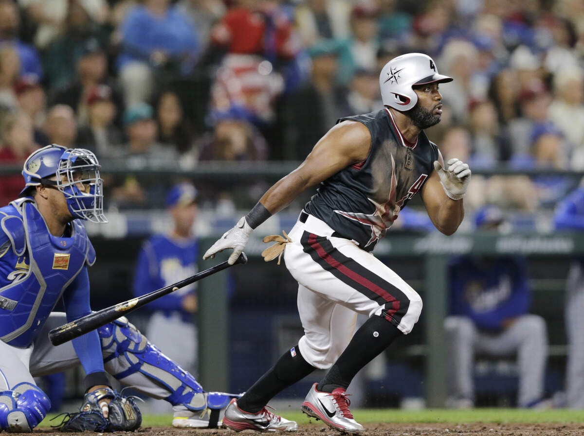 Seattle Mariners' Denard Span watches his RBI double against the Kansas City Royals during the third inning of a baseball game Saturday, June 30, 2018, in Seattle. (AP Photo/John Froschauer)