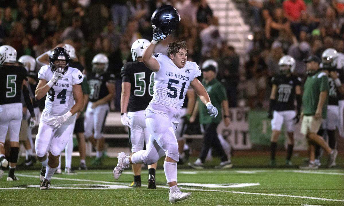 Gig Harbor lineman Keegan Johnson celebrates as time expires in the Tides’ come-from-behind victory, 21-20, over crosstown rival Peninsula Seahawks in Friday night’s Fish Bowl crosstown rivalry football game at Roy Anderson Field in Purdy, Washington, on Sept. 15, 2023.