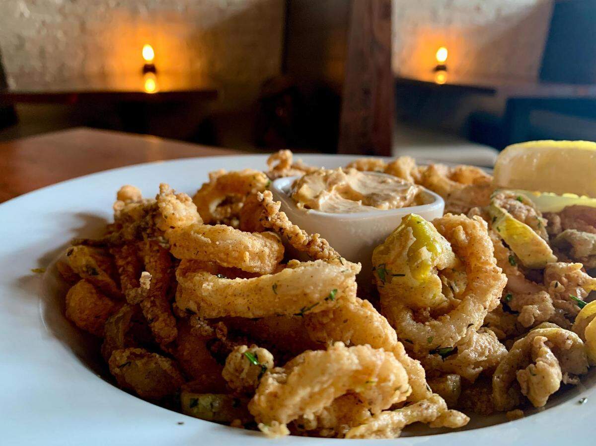 West 122 fries an addictive bowl of calamari with lots of tentacles and pepperoncinis, partnered with an Old Bay aioli.