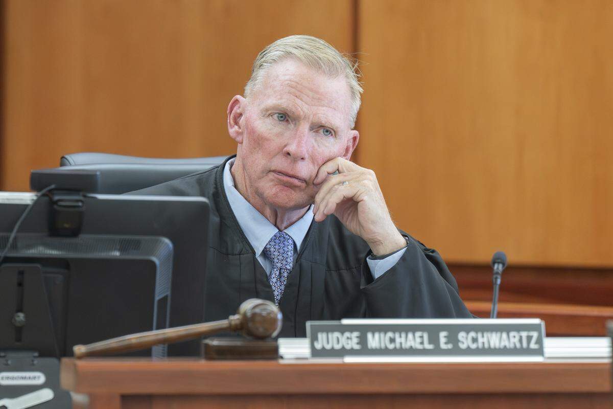 Judge Michael Schwartz oversees a sentencing hearing for former NBA star Shawn Kemp, 55, on Friday, Aug. 22, 2025, at Pierce County Superior Court in Tacoma, Wash. Kemp pleaded guilty in May to second-degree assault for shooting at an occupied car on March 8, 2023, outside the Tacoma Mall after he'd tracked his stolen cell phone to the parking lot.
