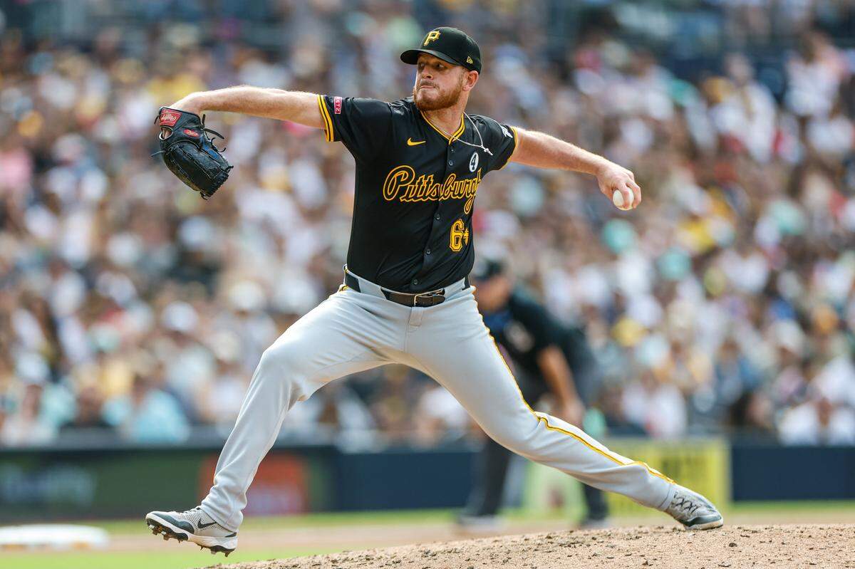 Jun 1, 2025; San Diego, California, USA; Pittsburgh Pirates relief pitcher Caleb Ferguson (64) throws a pitch during the seventh inning against the San Diego Padres at Petco Park. Mandatory Credit: David Frerker-Imagn Images