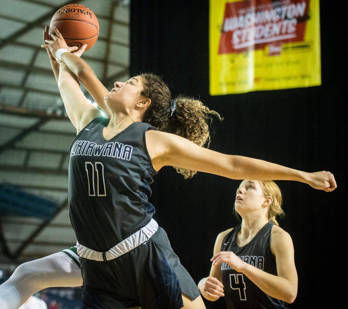 Chiawana’s Talia VonOelhoffen goes up for a rebound during the third quarter. Todd Beamer played Chiawana in a basketball game at Hardwood Classic at the Tacoma Dome in Tacoma, Wash., on Friday, March 6, 2020.