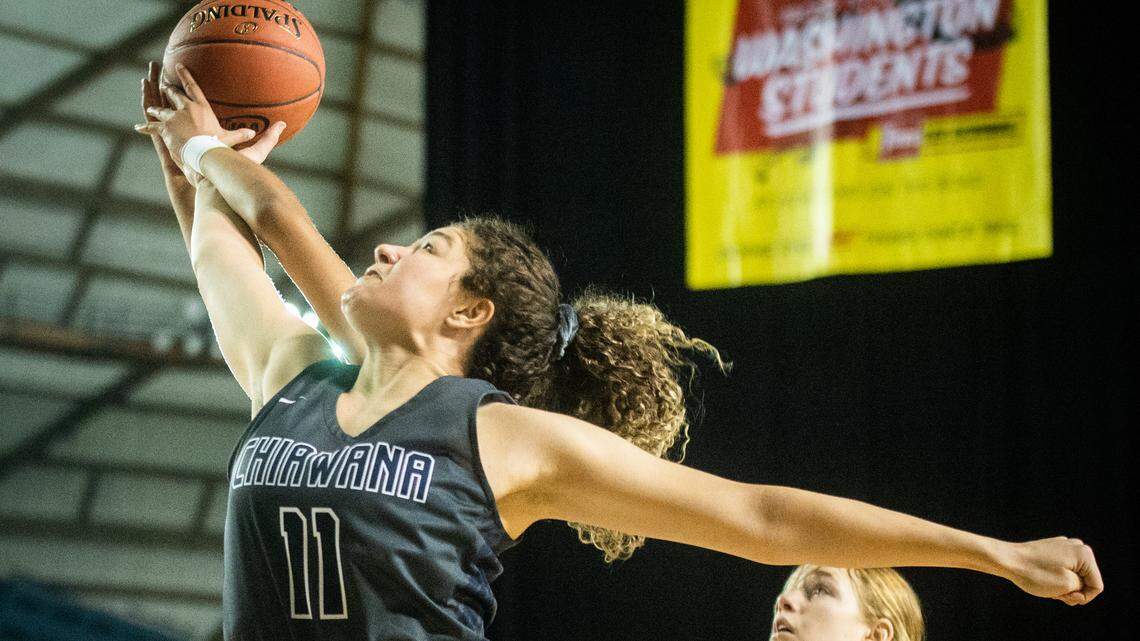 Chiawana’s Talia von Oelhoffen goes up for a rebound during the state tournament at the Tacoma Dome on March 6. She was named first-team all-state last week by The Seattle Times.