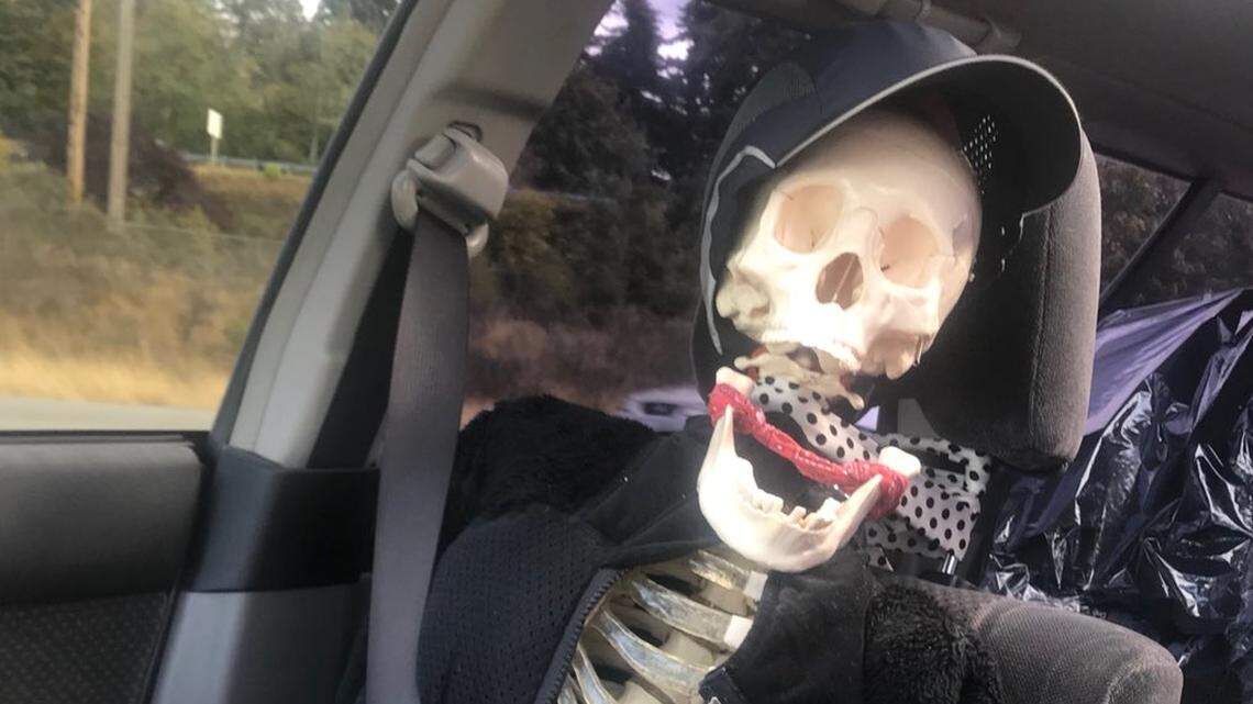 Washington state Trooper Axtman snapped this photo of a skeleton dressed up to fool people while the driver was in the HOV lane.