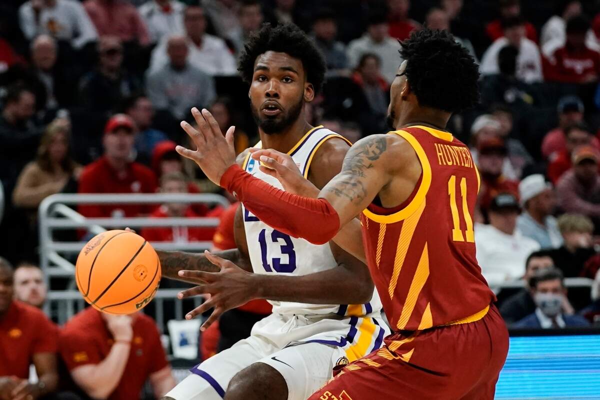 LSU’s Tari Eason tries to get past Iowa State’s Tyrese Hunter during the first half of a first round NCAA college basketball tournament game Friday, March 18, 2022, in Milwaukee. (AP Photo/Morry Gash)