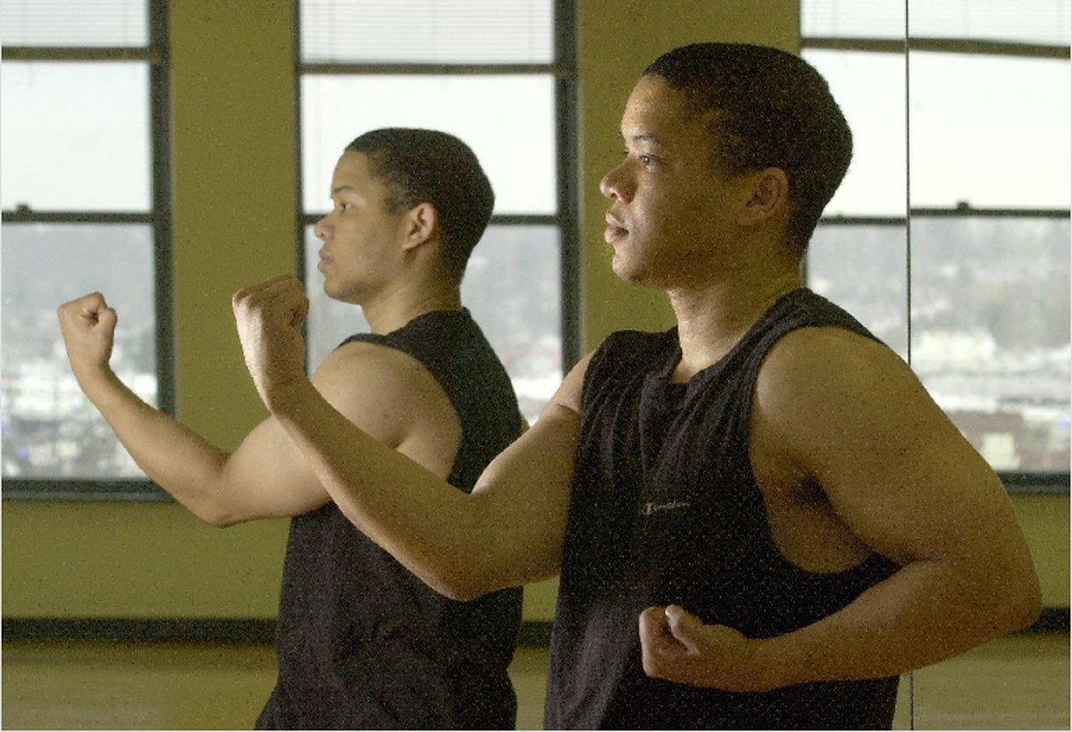 Jasmin moved to Washington for a job at the Bellingham Herald. This photo, which accompanied a story from 1999, shows Jasmin getting a workout at the downtown Bellingham YMCA. (Staff photo by Pete Kendall)