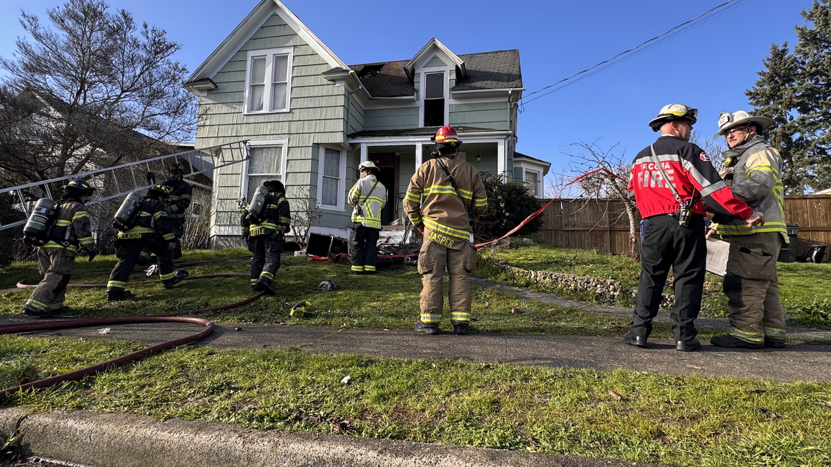 Fire crews were attending to hot spots at the scene of a house fire in the 1200 block of South Proctor Street on Monday.