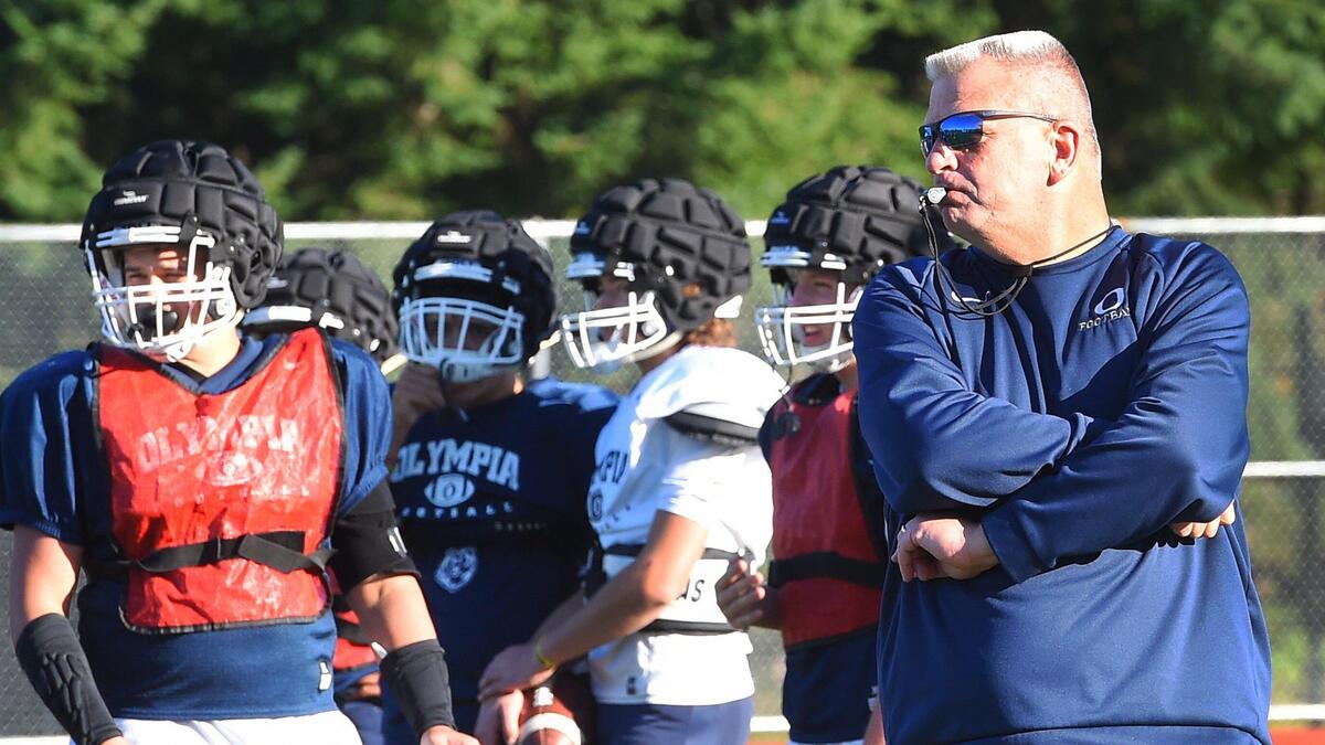 Olympia head coach Steve Davis watches afternoon practice on Oct 1st.