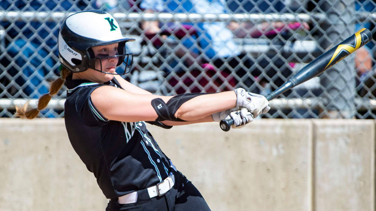 Kentwood’s Sarah Wright hits a 2-run homer in the bottom of the fourth inning of the District 2/3 tournament championship game against Skyview on Saturday, May 21, 2022, at Kent Service Fields in Kent, Wash.