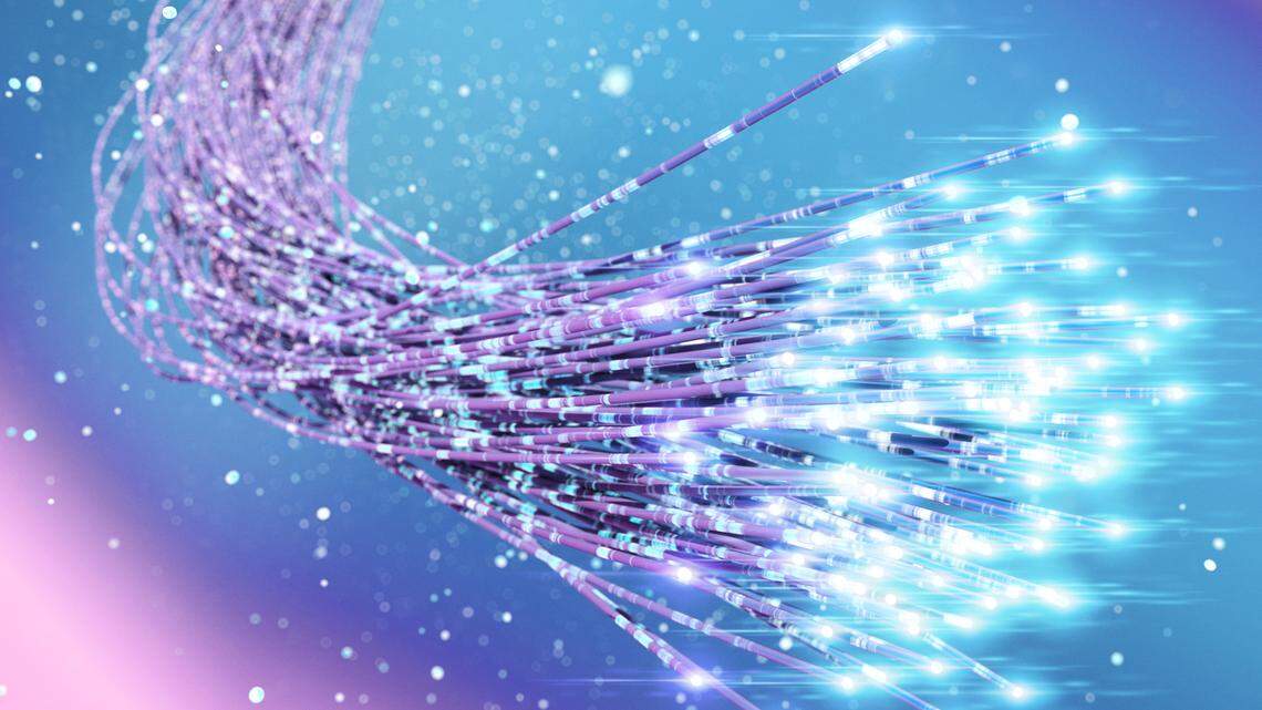 Fiber optic cable strand with glowing luminous ending.