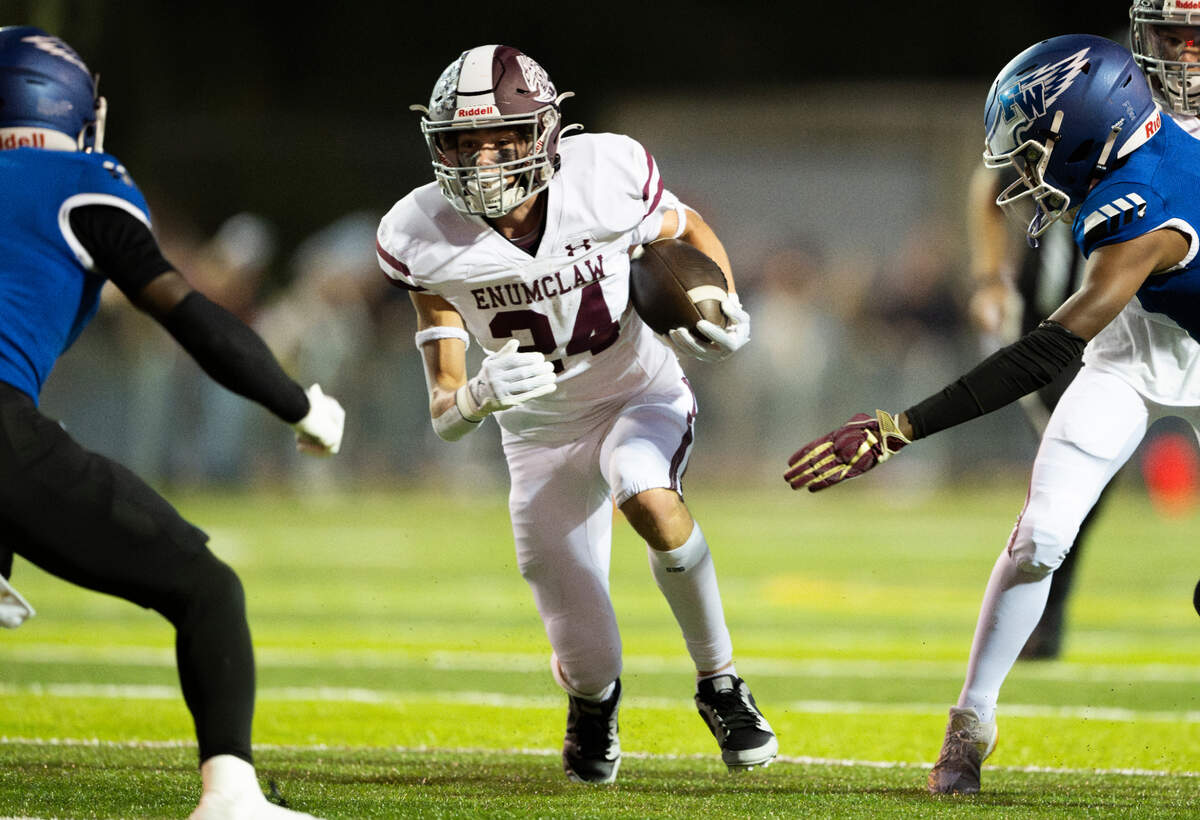 Enumclaw running back Louis Chevalier (24) carries the ball during the first half of the game against Federal Way at Pete’s Pool Ballfield, on Friday, Sept. 27, 2024, in Enumclaw, Wash.