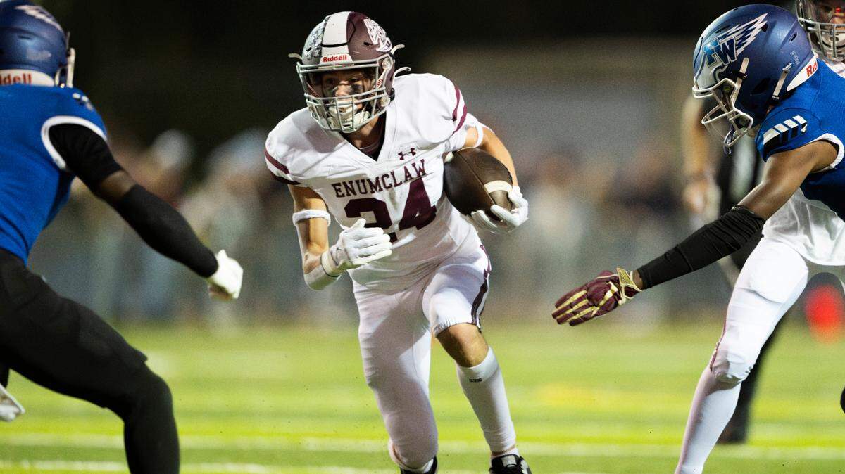 Enumclaw running back Louis Chevalier (24) carries the ball during the first half of the game against Federal Way at Pete’s Pool Ballfield, on Friday, Sept. 27, 2024, in Enumclaw, Wash.
