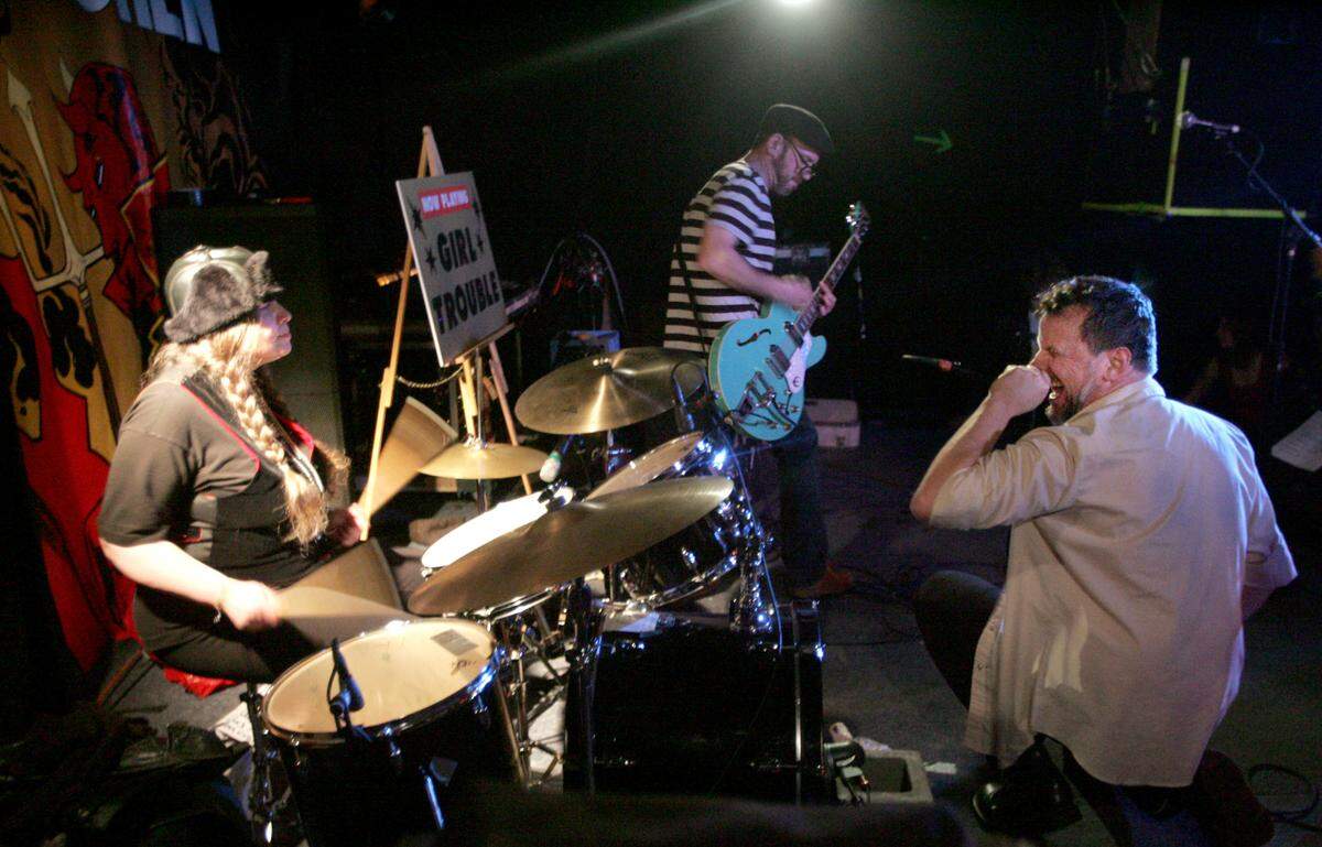 Girl Trouble’s Bon Von Wheelie on drums, Kahuna on guitar and lead vocalist, K.P. Kendall, from left, perform at the now-closed venue and bar Hell’s Kitchen, Saturday, January 26, 2008. (Janet Jensen/The News Tribune)