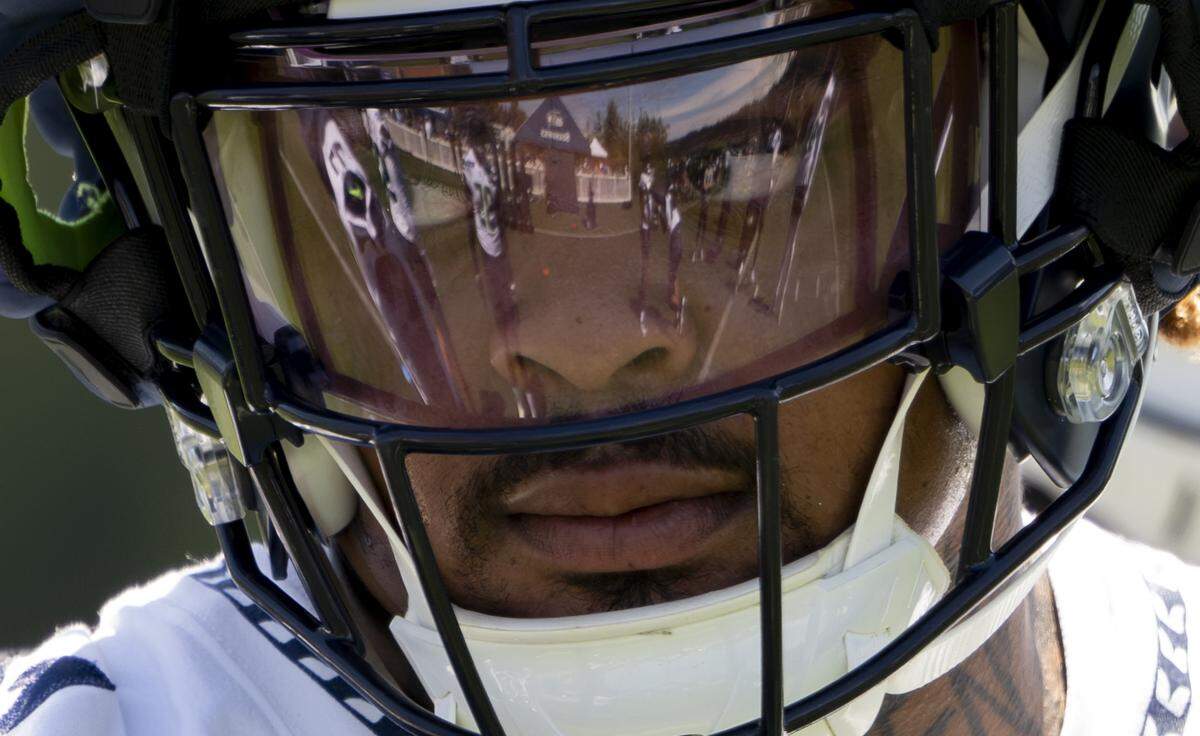 Seattle Seahawks defensive tackle Byron Murphy II (91) runs drills during the first day of training camp at the Virginia Mason Athletic Center, on Wednesday, July 24, 2024, in Renton.