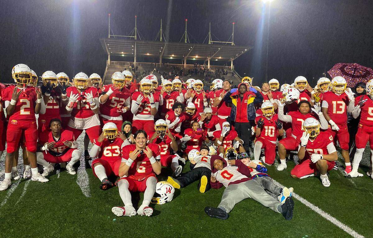 Mount Tahoma’s football team celebrates their 3A Puget Sound League Championship following a 28-7 win over Lakes at Mount Tahoma High School’s George Nordi Field on Oct. 31, 2025, in Tacoma, Wash.