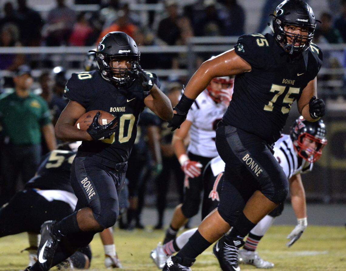Narbonne RB Keyshawn Dupree is escorted to endzone by Jonah Tauanu’u on 20 yard TD scamper. Palos Verdes at Narbonne football game Thursday August 30, 2018 (Photo by Robert Casillas,Contributing Photographer)