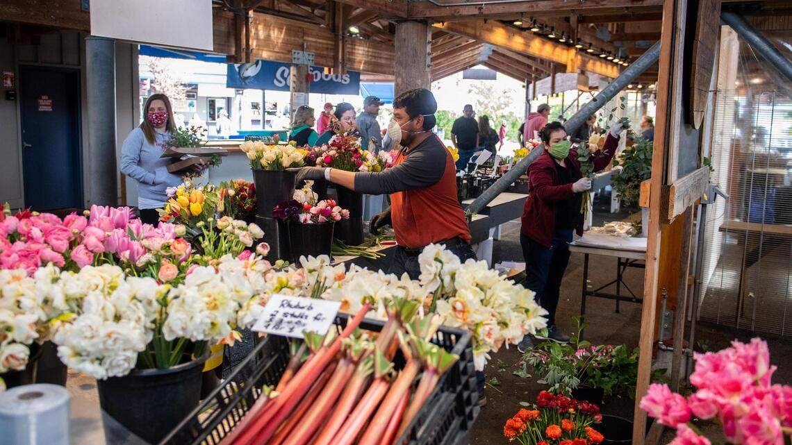 Buy lettuce and leave: Washington farmers markets open with limited vendors, new rules