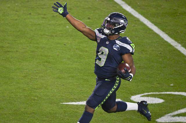 Seattle Seahawks running back Kenneth Walker III (9) runs the ball during Super Bowl LX at Levi’s Stadium in Santa Clara on Sunday, Feb. 8, 2026.