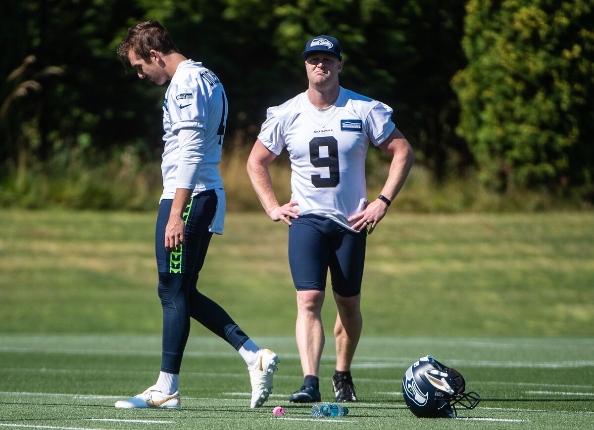 Jon Ryan (9) and Michael Dickson (4) walk the field during Seattle Seahawks training camp at the Virginia Mason Athletic Center in Renton, Wash., on Thursday, July 26, 2018.