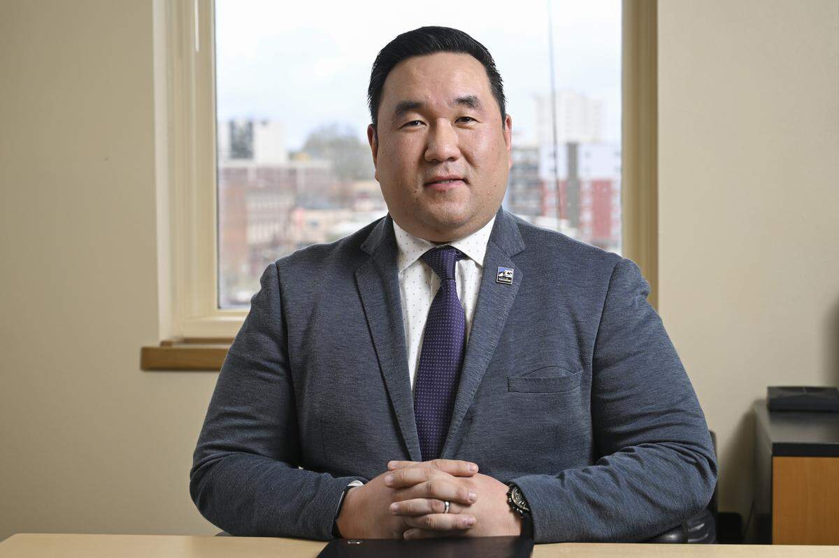Hyun Kim, Tacoma’s new city manager, sits for a portrait in his office at City Hall on Thursday, April 2, 2026, in Tacoma, Wash.