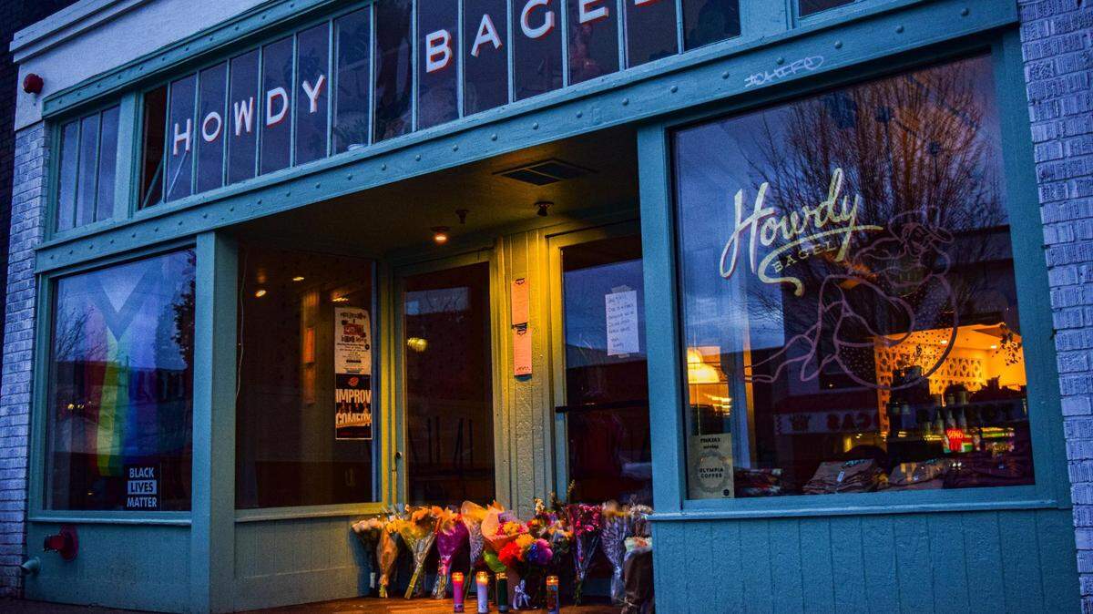 A memorial in honor of Howdy Bagel co-founder Jake Carter grew at the restaurant entrance, 5421 South Tacoma Way in Tacoma on Sunday, Jan. 7, 2024. Carter was fatally shot in New Orleans on Jan. 5.