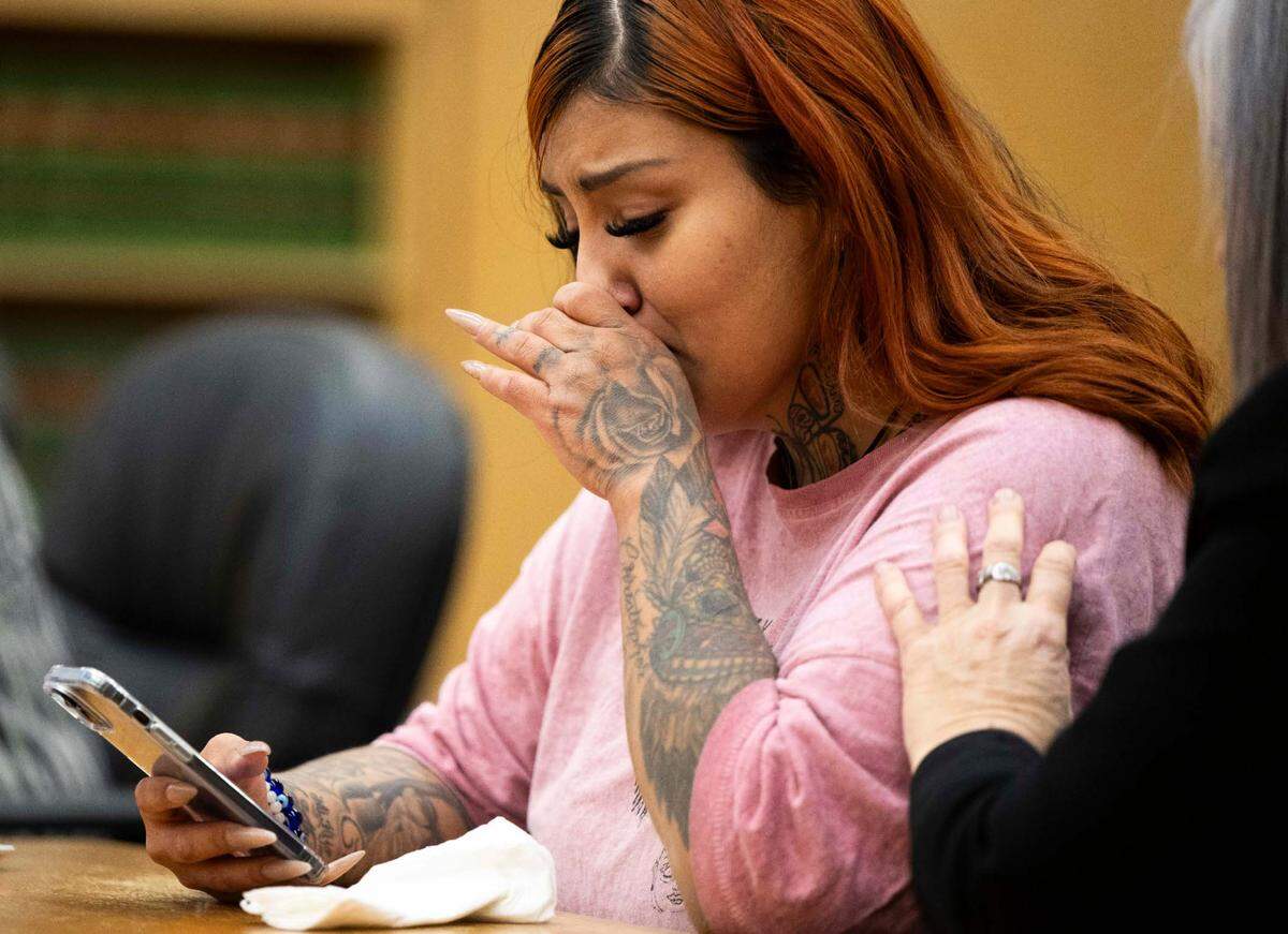 Elena Mayoral, sister of Raymond Williams and Maria Nunez, chokes up whiling giving a statement to the court prior to Maleke Pate, 24, being sentenced for four counts of aggravated first-degree murder in the Oct. 21, 2021 killing of four people, at Pierce County Super Court, on Friday, May 3, 2024, in Tacoma, Wash.