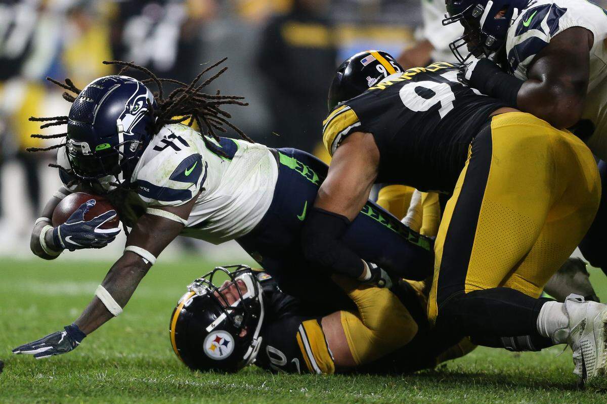 Seattle Seahawks running back Alex Collins (41) rushes during the fourth quarter. The Seattle Seahawks played the Pittsburgh Steelers at Heinz Field in Pittsburgh, Pa., on Sunday, Oct. 17, 2021.