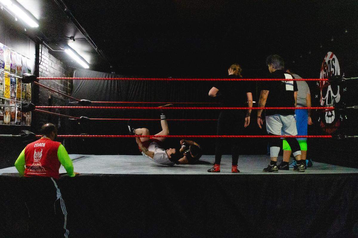Lucha Libre Volcanica students practice stunts during their class at a small gym in Tacoma on Sunday, May 5.