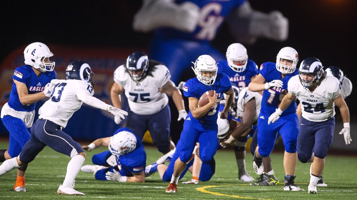 Graham-Kapowsin running back Shabro Johnson breaks loose for a 61-yard touchdown run during Thursday night’s football game against the Rogers Rams at Art Crane Field in Spanaway on Oct. 18, 2018.