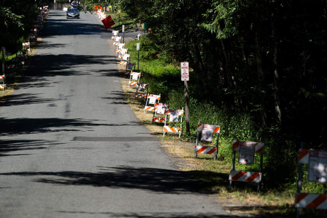 No-parking signs line sections of the road that leads into North Lake Tapps Park, on Monday, July 15, 2024, in Bonney Lake, Wash.