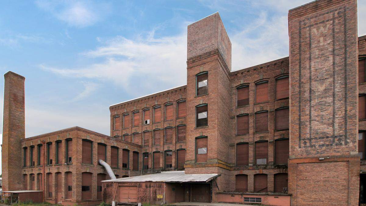This 240,000-square-foot industrial and manufacturing building is in Tacoma's Nalley Valley. Its new owners plan to do routine maintenance and keep its tenants, some of whom have been there since the 1960s.