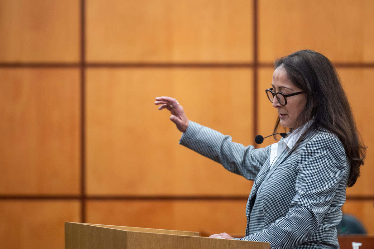 Washington state assistant attorney general Barbara Serrano addresses the jury with the prosecution’s opening statement in Pierce County District Court on Wednesday, Nov. 30, 2022, in Tacoma.