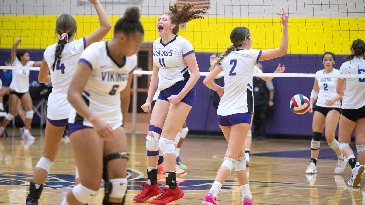 Puyallup’s Rylie Hangca (from left), Rebecca Wilber, Dani Brown and Reese Sheppard celebrate as the Vikings come back in the fourth set agains the Curtis Vikings in Monday night’s 4A SPSL volleyball match at Puyallup High School in Puyallup, Washington, on Oct. 16, 2023. Puyallup won the match in four sets.