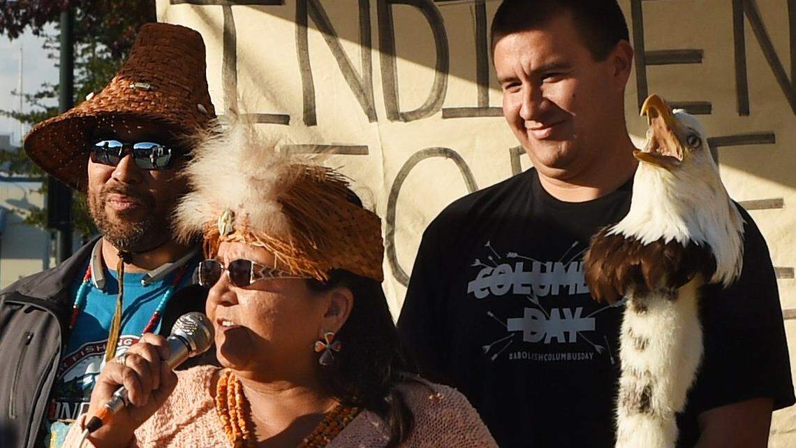 Puyallup tribal member Nancy Shippentower and Nisqually Tribal Council members Hanford McCloud (left) and Willie Frank lll address the audience during the second annual Indigenous People’s Day event in October 2016 at Olympia’s Heritage Park. Tacoma is poised to replace Columbus Day with Indigenous People’s Day.