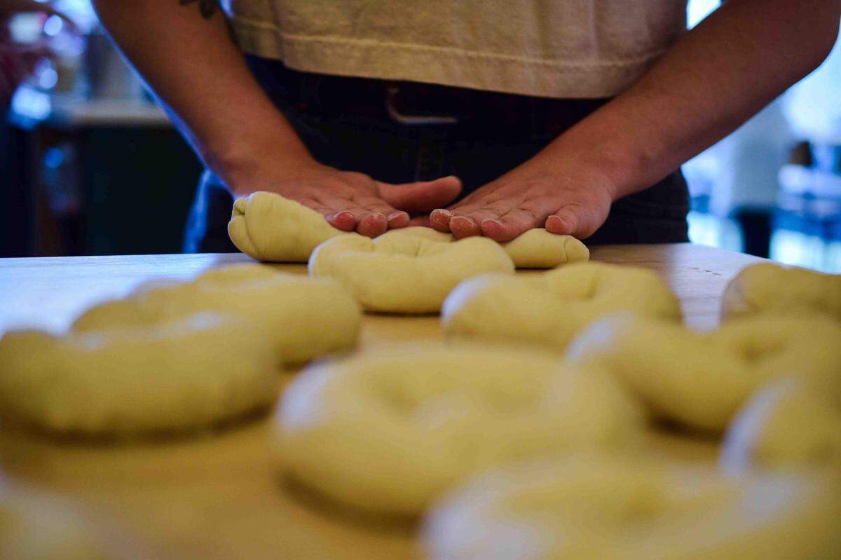Howdy rolls every bagel by hand and cold-ferments for up to 36 hours.