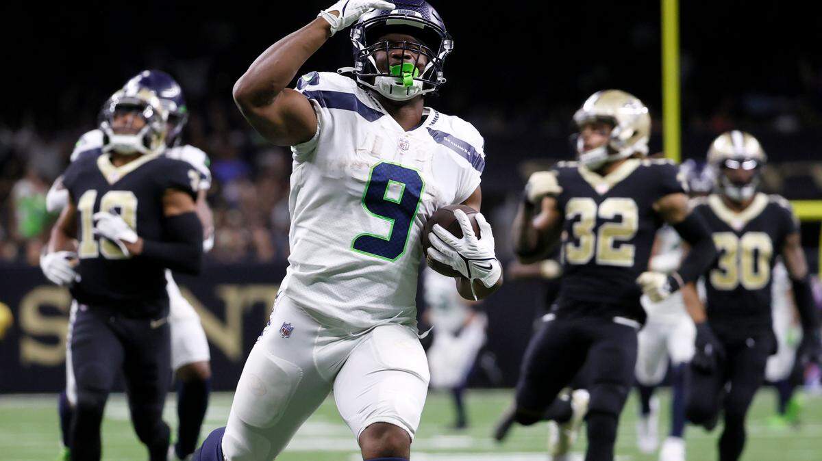 Seattle Seahawks running back Kenneth Walker III begins to celebrate his 69 yard rushing touchdown during an NFL football game against the New Orleans Saints in New Orleans, Sunday, Oct. 9, 2022. (AP Photo/Derick Hingle)