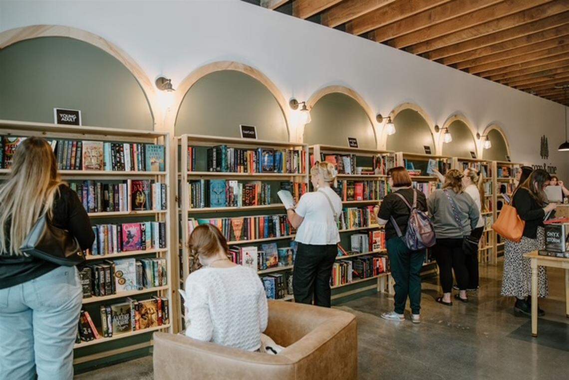 Customers shop at Page & Pine, Puyallup’s newest bookstore, during its soft opening week. The store first launched its soft opening on June 27.