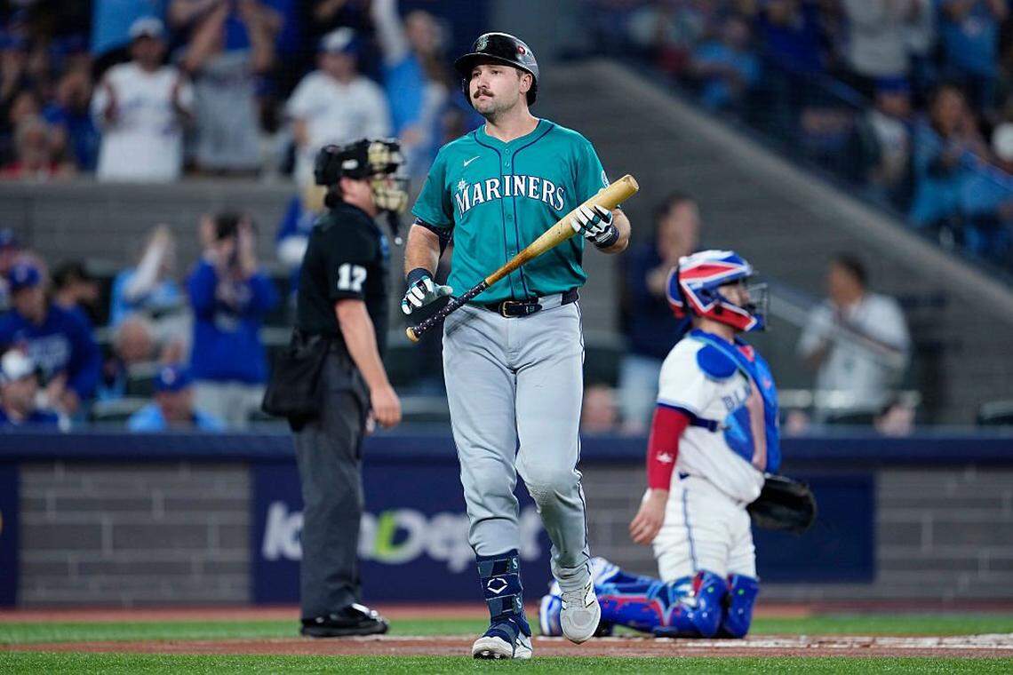 TORONTO, ONTARIO - OCTOBER 19: Cal Raleigh #29 of the Seattle Mariners looks on after striking out during the first inning against the Toronto Blue Jays in game six of the American League Championship Series at Rogers Centre on October 19, 2025 in Toronto, Ontario. (Photo by Mark Blinch/Getty Images)
