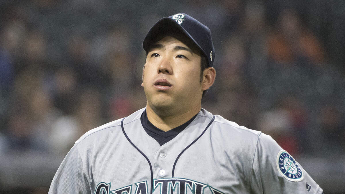 Seattle Mariners starting pitcher Yusei Kikuchi walks to the dugout after retiring the Cleveland Indians to end the fifth inning of a baseball game in Cleveland, Friday, May 3, 2019.