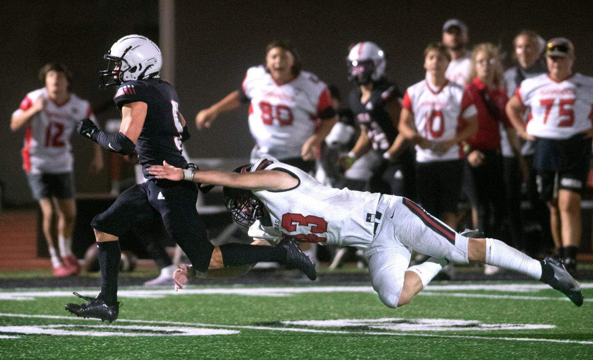 Yelm wide receiver Kyler Ronquillo breaks loose from Camas linebacker Nikko Speer for a touchdown reception during Friday night’s season-opening football game at Yelm High School in Yelm, Washington on Friday, Sept. 2, 2022.