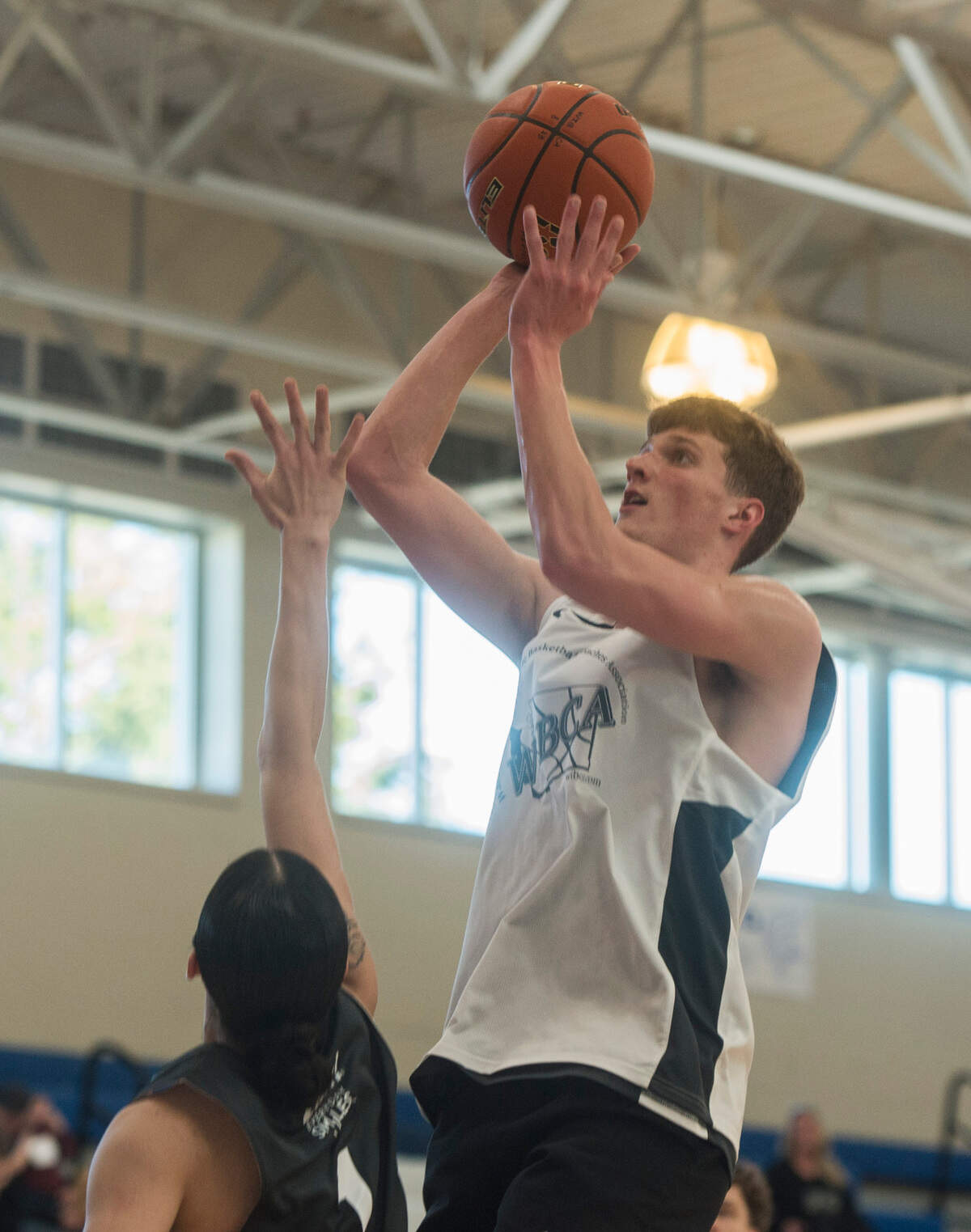Brewster’s Kelson Gebbers puts up a shot during the Class 2B vs. Class 1B game at the WIBCA All-Star Weekend on Saturday, March 18, 2023 at Curtis High School in University Place, Wash.