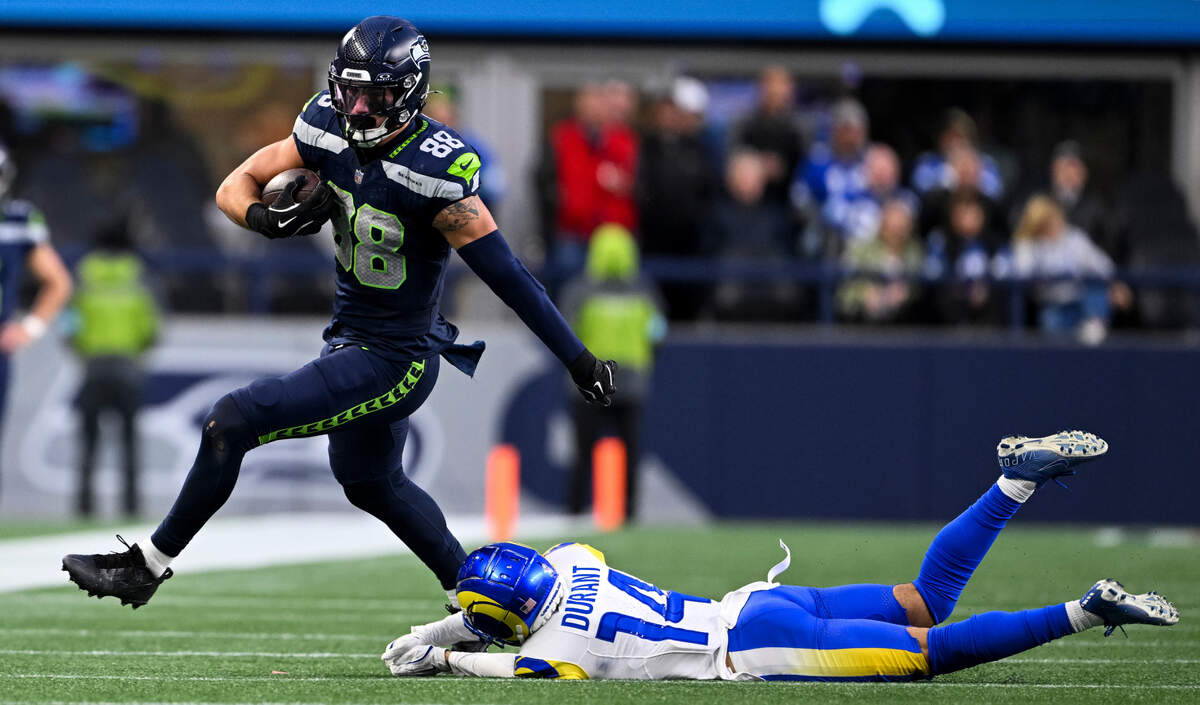 Seattle Seahawks tight end AJ Barner (88) breaks a tackle form Los Angeles Rams cornerback Cobie Durant (14) during the fourth quarter of the game at Lumen Field, on Sunday, Nov. 3, 2024 in Seattle, Wash.
