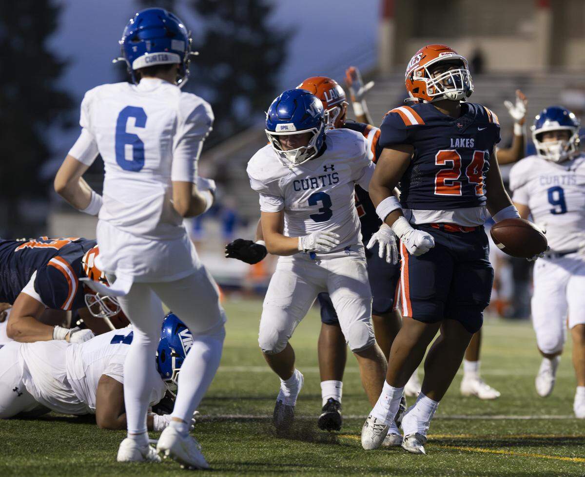 Lakes running back Romiece Taviumi (24) reacts to a rushing touchdown against the Curtis Vikings during the first half of the game at Harry Lang Stadium, on Friday, Sept. 19, 2025, in Lakewood, Wash.
