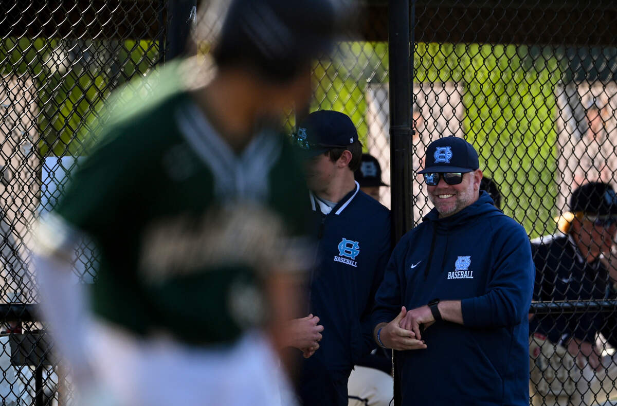 Gig harbor head coach Ben Sleeter watches from the dugout against Timberline during the baseball game at Sehmel Homestead Park, on Wednesday, April 30, 2025, in Gig Harbor, Wash.